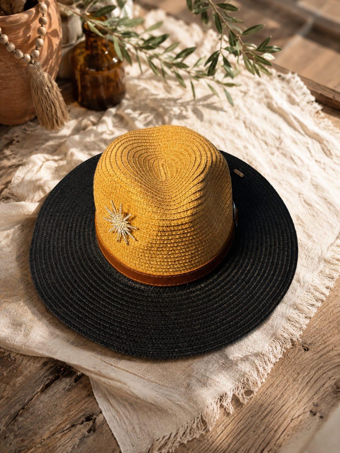 Loan straw hat by Sapé